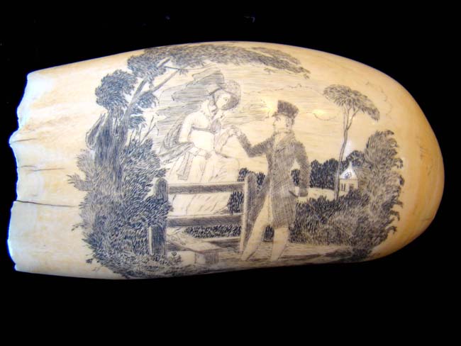 A highly detailed and beautiful 19th century scrimshaw whale's tooth circa 1840